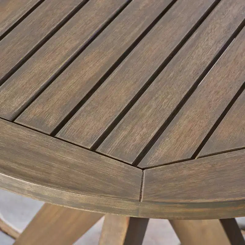 Table de bistrot ronde d'extérieur Brigitte en bois d'acacia avec base croisée GDFStudio