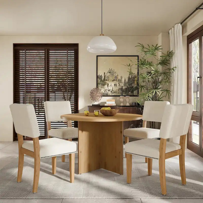 Ensemble de salle à manger moderne Sakin 5 pièces avec table ronde à piédestal et chaises rembourrées par GDFStudio