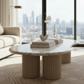 Table basse avec plateau en marbre de forme galet