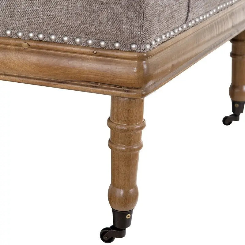 Pouf ottoman Grafton Home Woodland en velours touffeté en losange avec clous décoratifs et roulettes