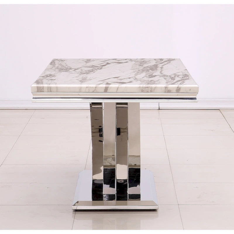 Table de salle à manger noire avec pieds en métal doré poli