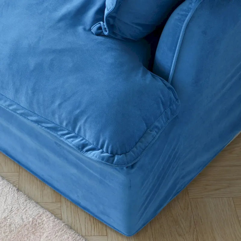Canapé d'angle modulable en velours "Cloud" avec plumes et duvet, convertible et très large.